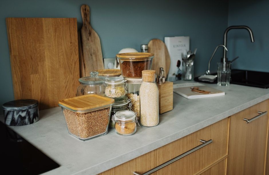 A compact kitchen with jars and practical work surfaces